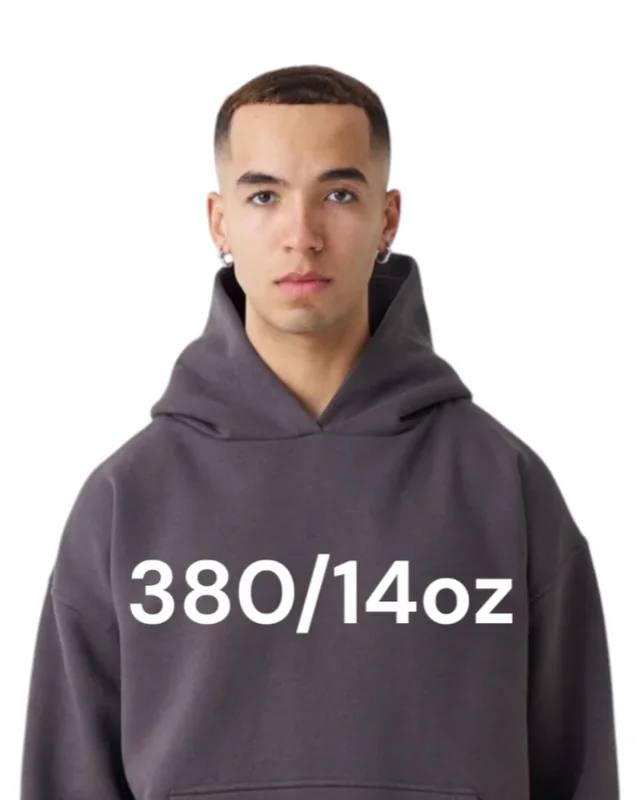 Charcoal 380 gram 14 ounce heavyweight hoodie worn by a model